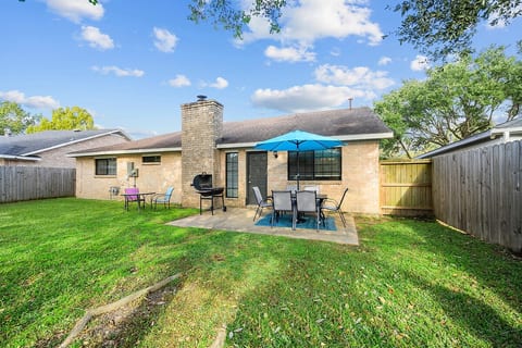 Grab your morning coffee and enjoy the beautiful backyard, while enjoying breakfast at the outdoor table big enough for the whole family.