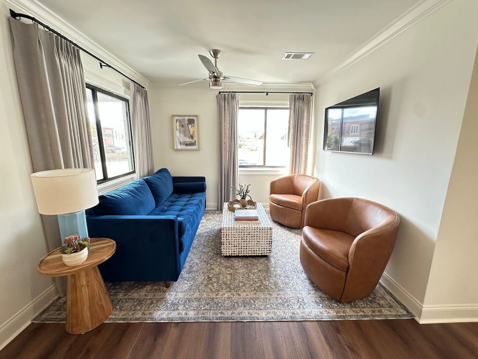 Living room with queen sleeper sofa and smart TV