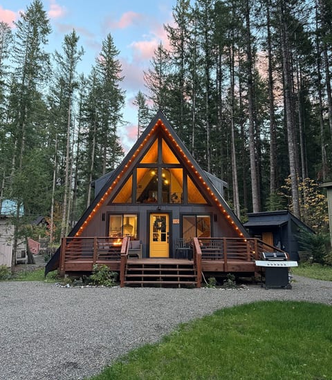 Warm, inviting a-frame is ready to welcome you for your vacation. Just completed May 2023!