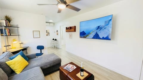 Relax, unwind on our oversized, and plush sofa watching your favorite show on the 65 inch curved Samsung TV