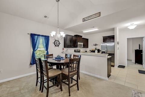 Kitchen/Breakfast Bar: Open kitchen and breakfast bar keep everyone connected while cooking, eating, or planning the day’s adventures.