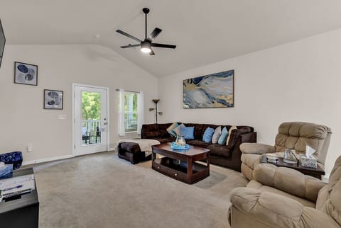 Living Room: Spacious, comfortable living room with plenty of room for everyone to relax after a day at the beach.