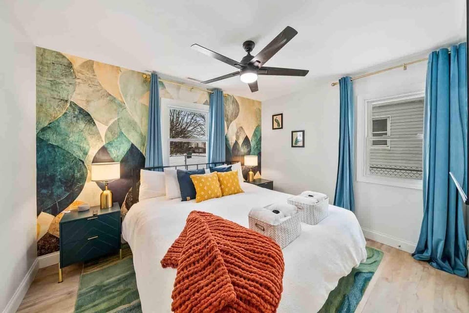 Relax in the Primary Bedroom with a King Bed and Premium Purple Mattress