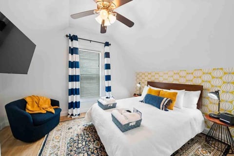 Rest easy in the tranquil primary bedroom, featuring a plush Queen-sized Purple mattress for unbeatable comfort. This thoughtfully designed space is your personal retreat for peaceful nights and rejuvenating mornings.