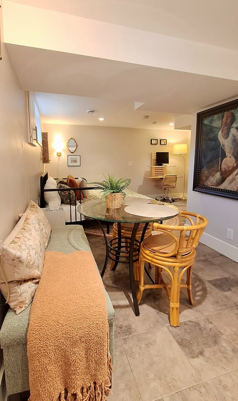 Cozy dining nook with lounge seating and a handy workspace
