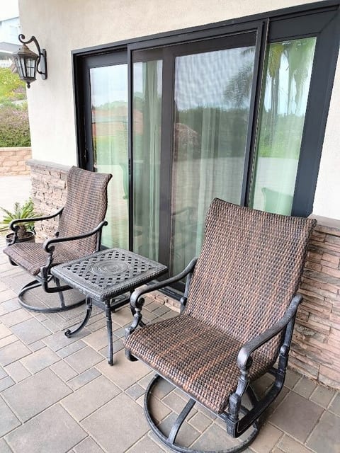 Seating area for two so you can enjoy the outdoors and hillside views.