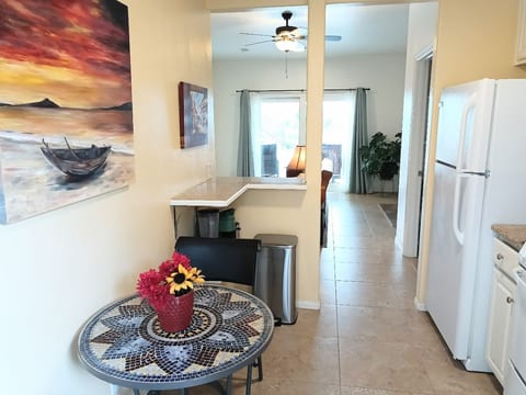 From main entrance, you step into the kitchen area.