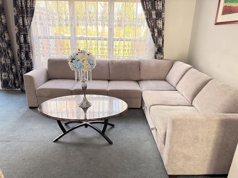 Living room with brand new sectional sofa
