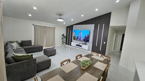 Spacious living room with comfortable seating for the whole group.