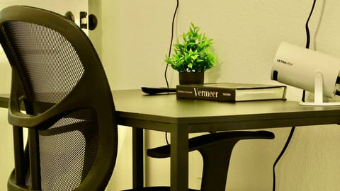 Modern workspace with ergonomic chair and sleek, minimalist styling