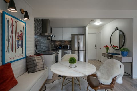 Enjoy dining in or catching up on work at this beautiful dining table with outdoor views