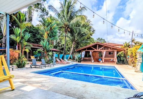 Pool View From the Patio of Cabina Plumeria with Cabina Bamboo across