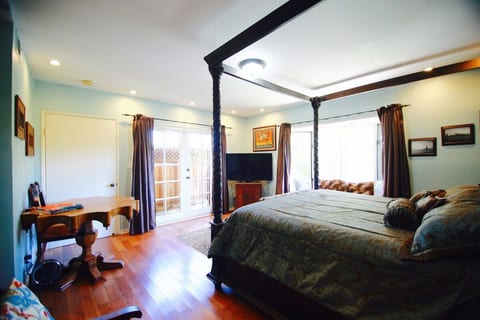 Dining table, TV with streaming channels, California King bed
