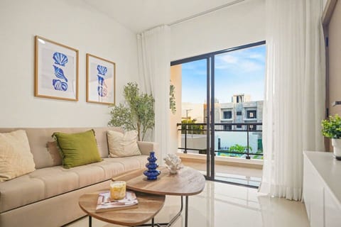 Modern 2BR • Pool • 5 Min to Coco Bongo & Downtown