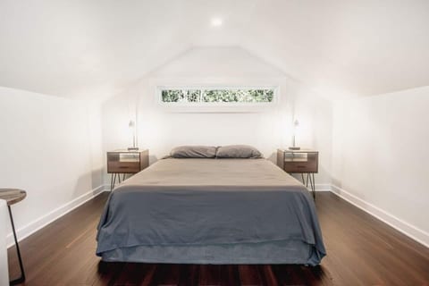 Bright, airy, and minimalist in style, the loft affords the perfect space to recharge the mind and soul. Clean, comfortable bedding is provided, and the bedside lamps have built-in USB charging ports for your convenience.