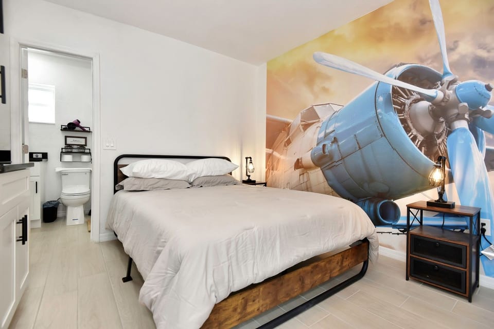 Queen bed with a newly renovated space with exciting decor