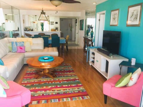 This is the living room standing in front of the sliding glass doors to the balcony.