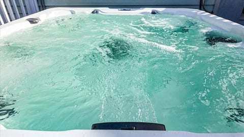Your private island escape. Soak in the bubbling hot tub on our secluded covered porch—the perfect way to unwind at Sand and Sea Manor after a day exploring Galveston’s beaches and the historic Strand district.