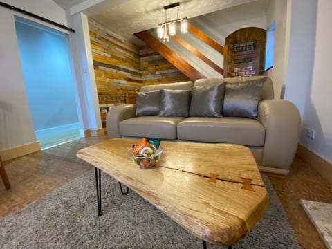 Live-edge coffee table in the extended living room
- Mar'24