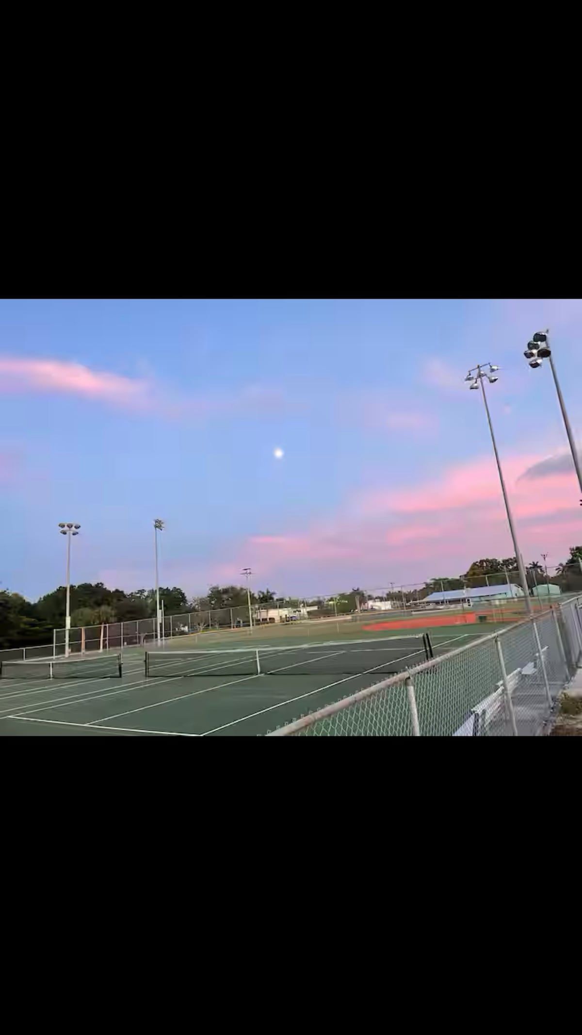 Tennis and pickle ball courts at the center park