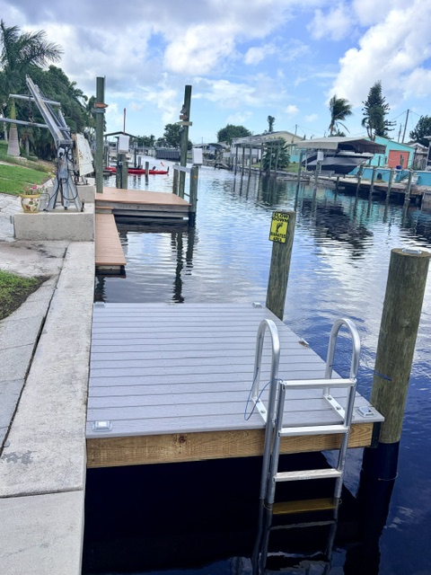We added cleats, solar lights and a manatee sign to our dock. Enjoy!