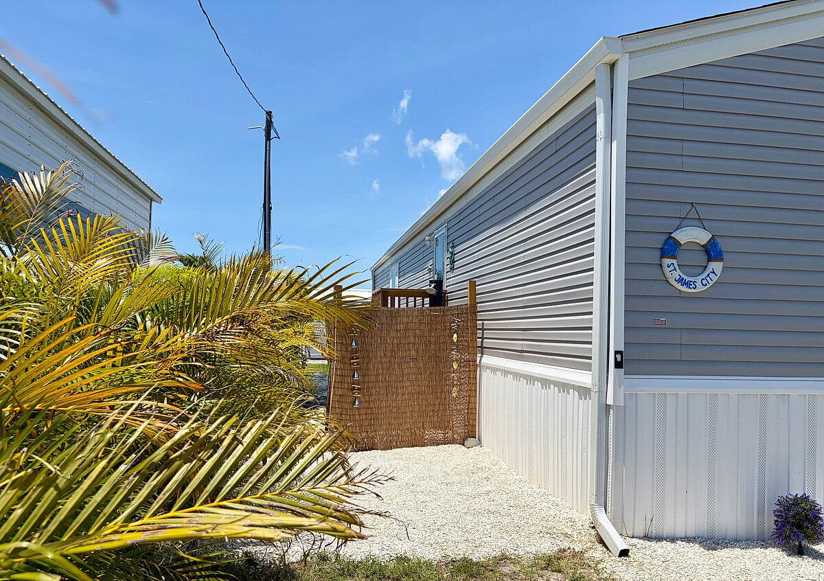 You will love our outdoor shower surrounded with palms and bamboo and even seashells