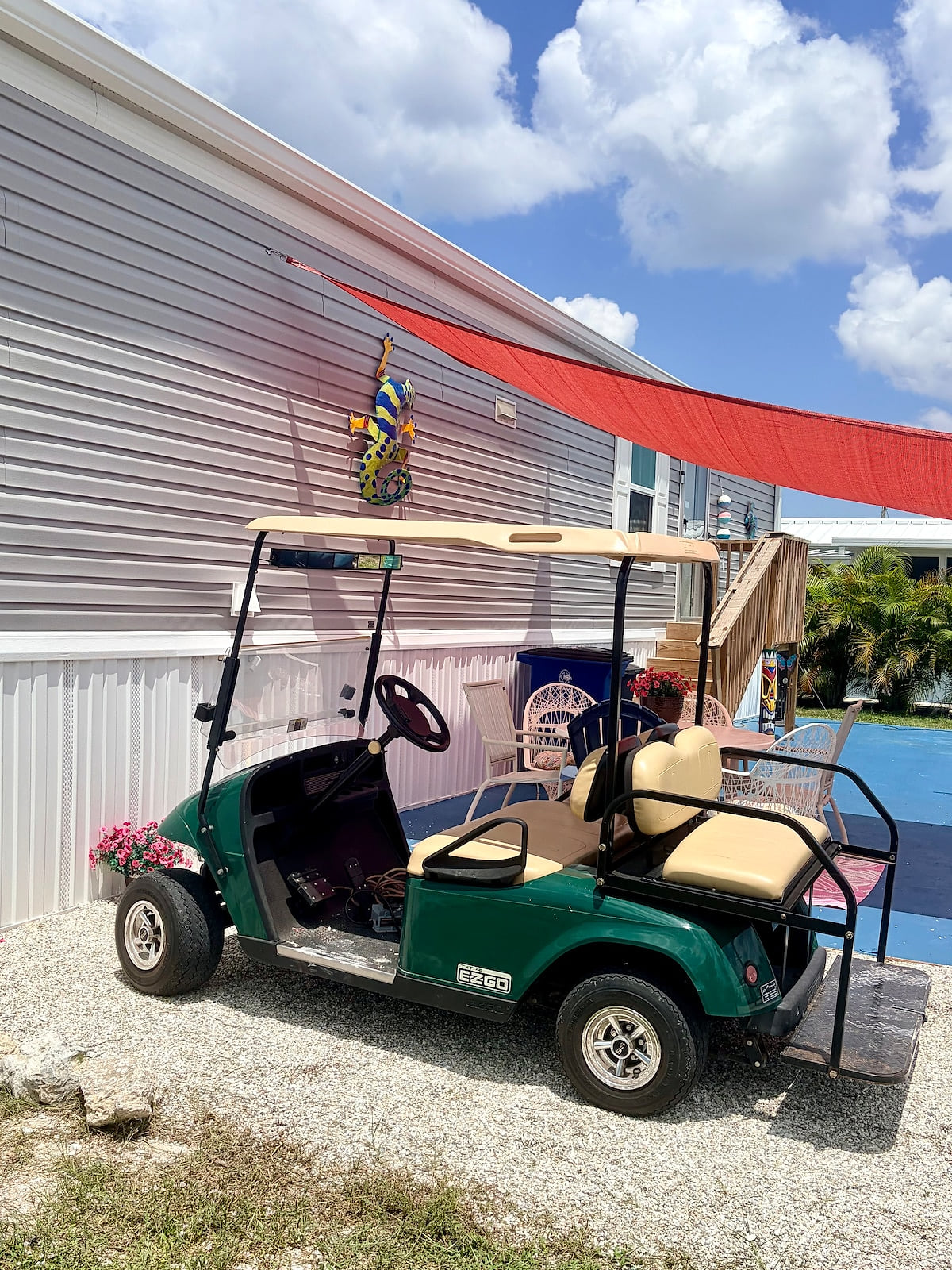 Our cool golf cart and its own spot to park!