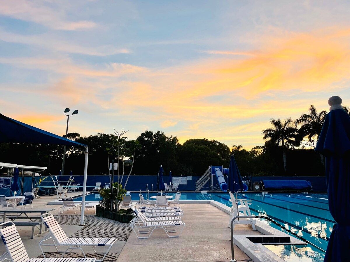 Pine Island Community Pool!  another pool, heated, has a diving board and 2 water slides.  Fun spot to check out.  A few minutes from our house, it's about 3 miles.  $3 adults, $2 for seniors and kids!  
It has a big park all around the pool.