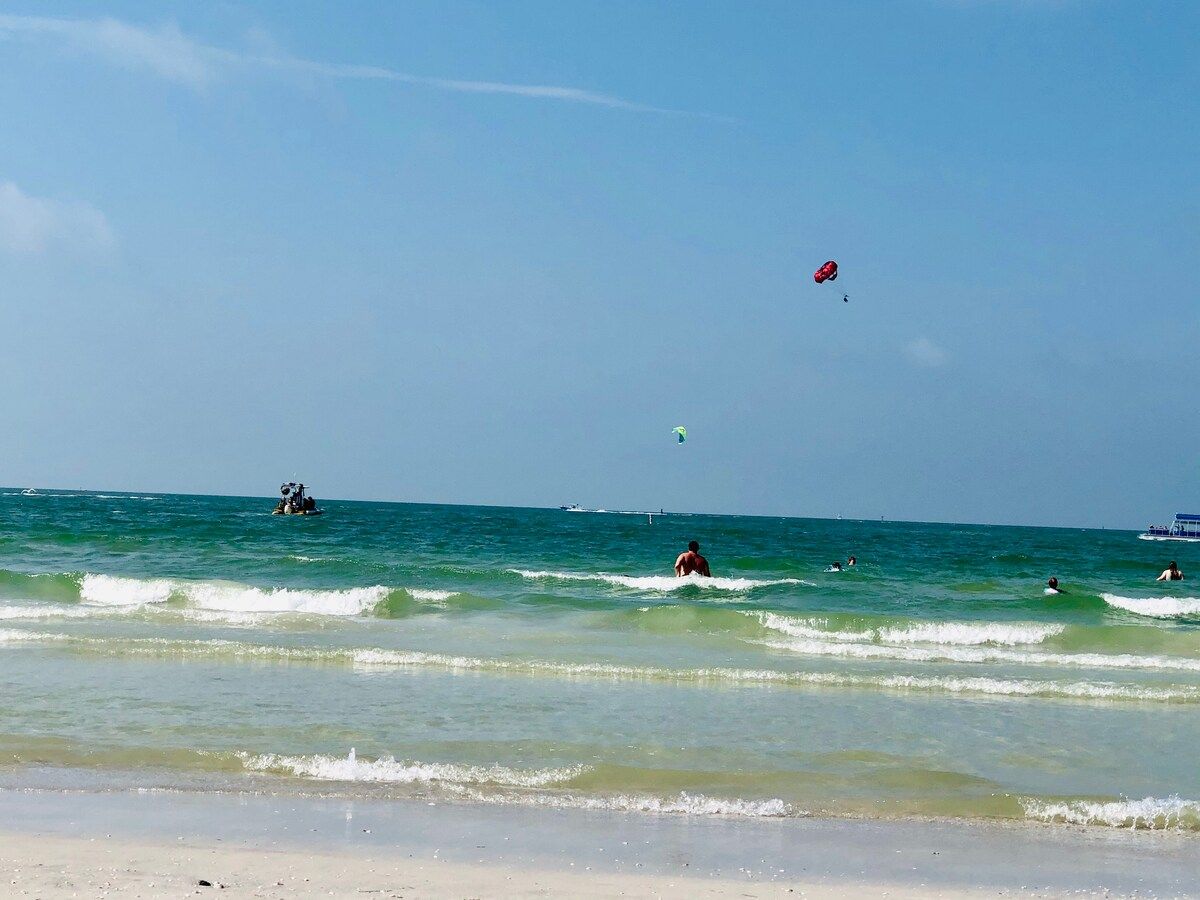 Fort Myers Beach.  Tons of water sports and activities.