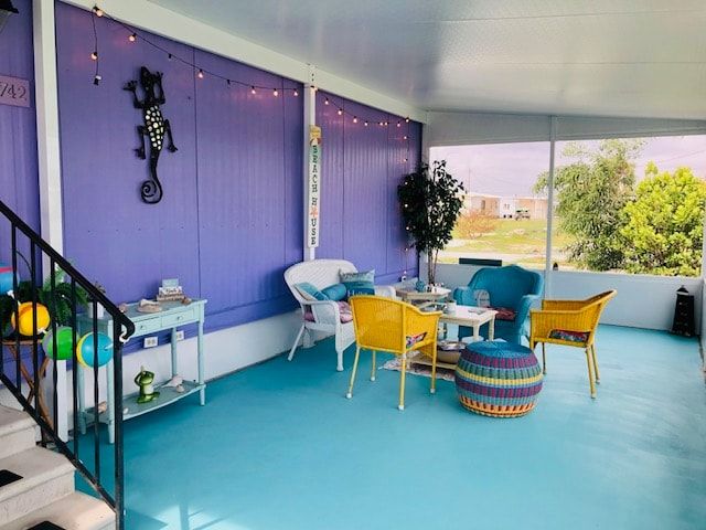 Our Cute Sunroom!! Many board games under the tables to play