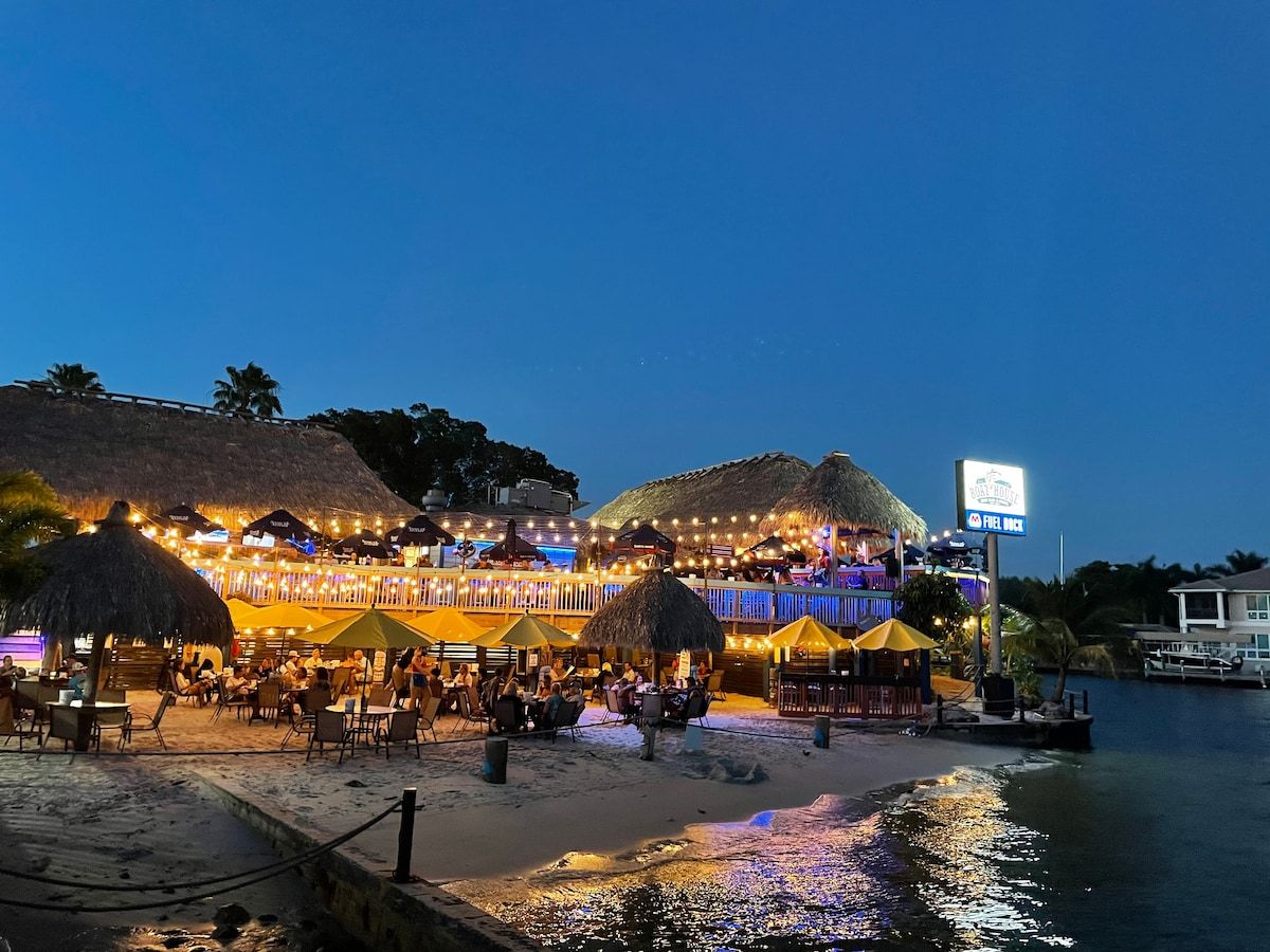 Cape Coral yacht Beach club restaurant on the water! You can dine with your toes in the sand pretty cool spot.
