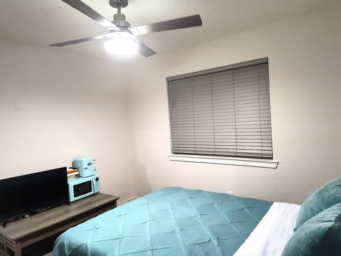 There is a remote for the ceiling fan.