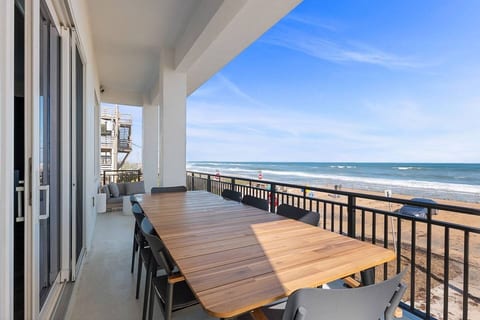 Oceanfront, heated Pool, Beach, New Smyrna Beach, Vacation rental, Outdoor patio dining and lounge