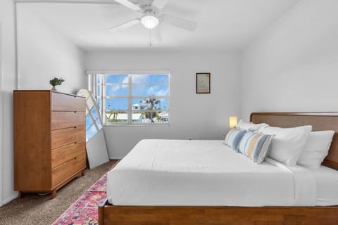 Primary queen suite with private ensuite and plenty of natural light