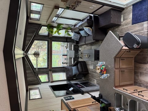 Funky Island - Aerial perspective of the kitchen and living space, designed for easy living and gathering.