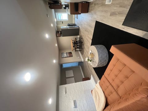 View walking in the front door.  Living area/dining