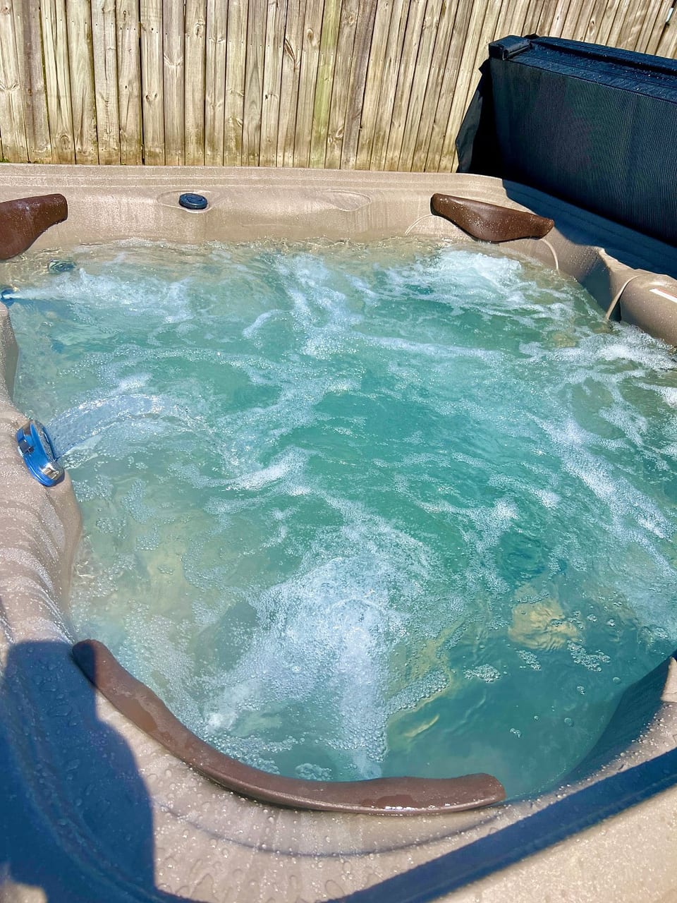 4 person Hot Tub in the back yard. There is a privacy fence on all sides off the yard.