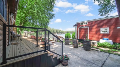 Gorgeous view of lake with plenty of seating for relaxation with friends & family