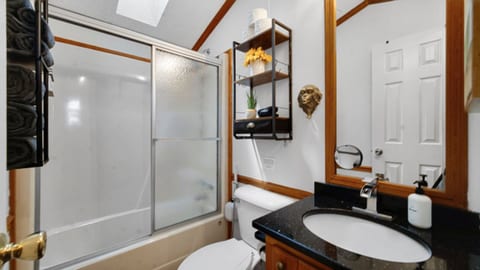 Clean and comfortable bathroom stocked with essentials.