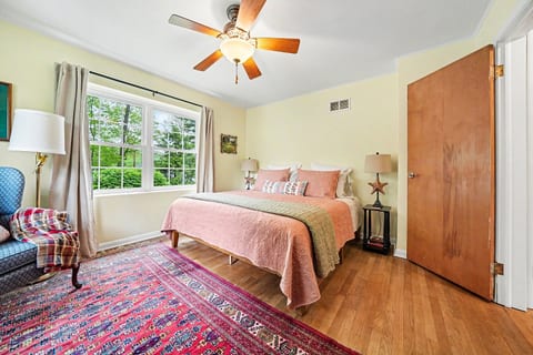 Large primary bedroom centered around a king bed, perfect for stretching out and recharging.