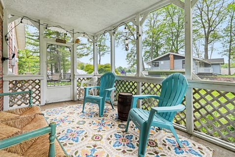 A quiet screened porch where you can sit back, enjoy the breeze, and relax any time of day.