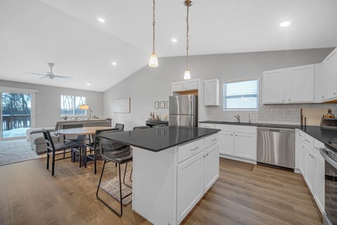 Open-concept kitchen and living room, perfect for relaxing or entertaining.