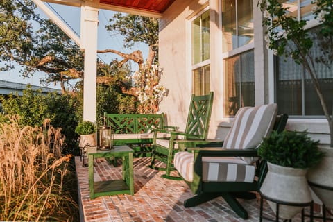 Polywood rocking chairs make the patio the perfect place to view various local parades just feet away, including the Mardi Gras Parade and Cruisin' the Coast each year.