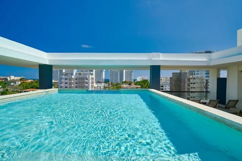 Caribbean Beach Walk 2BR + Roof Top Pool +Wifi