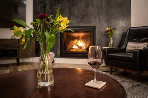 Fresh flowers, a glass of red, and a fire that never needs tending. This is what a night at the Hilltop Guest House feels like.