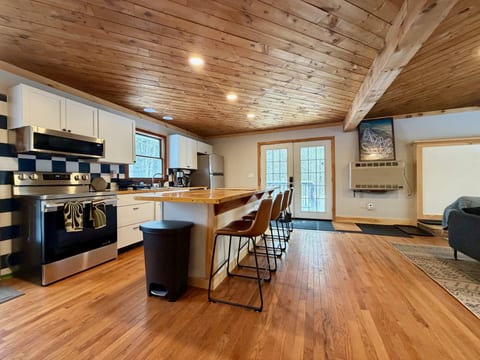 Pull up a stool while dinner comes together across the kitchen counter.