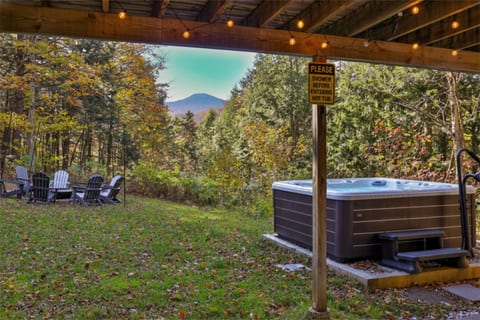 Soak in the private hot tub beneath the deck. Included late December to mid March; otherwise optional for $195, arranged with management.