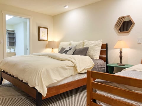 Bedroom #2 features a king bed, an XL twin bed, and a large walk-in closet.
