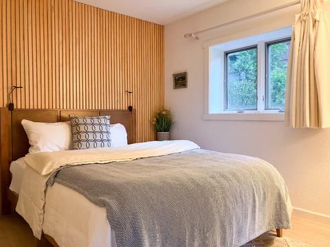 Quiet bedrooms designed for deep rest after a day in Yosemite.