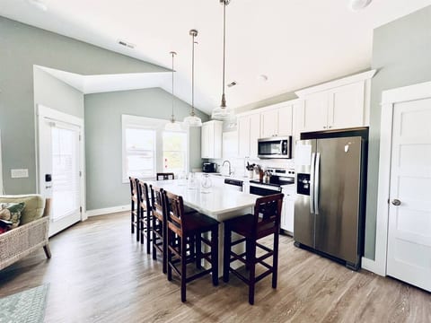 Your culinary canvas: a white-themed kitchen ready for your culinary masterpieces.
